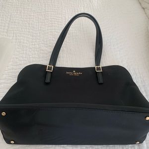 Black Kate Spade bag.